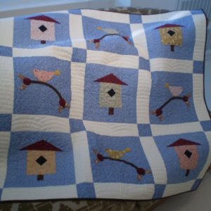 BLD-026 – “BIRDIE IN THE TREE TOP” Lap Quilt
