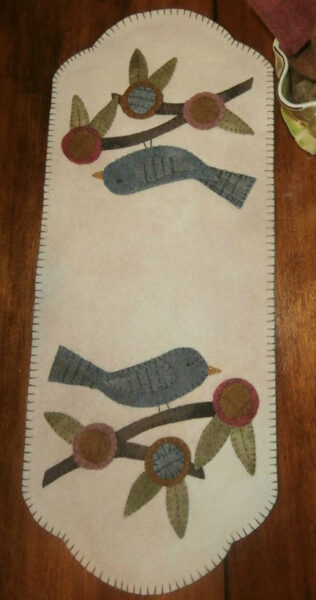 BLD-002 – “PENNY BLOSSOMS – Summer’s Song”  Wool Applique Table Mat